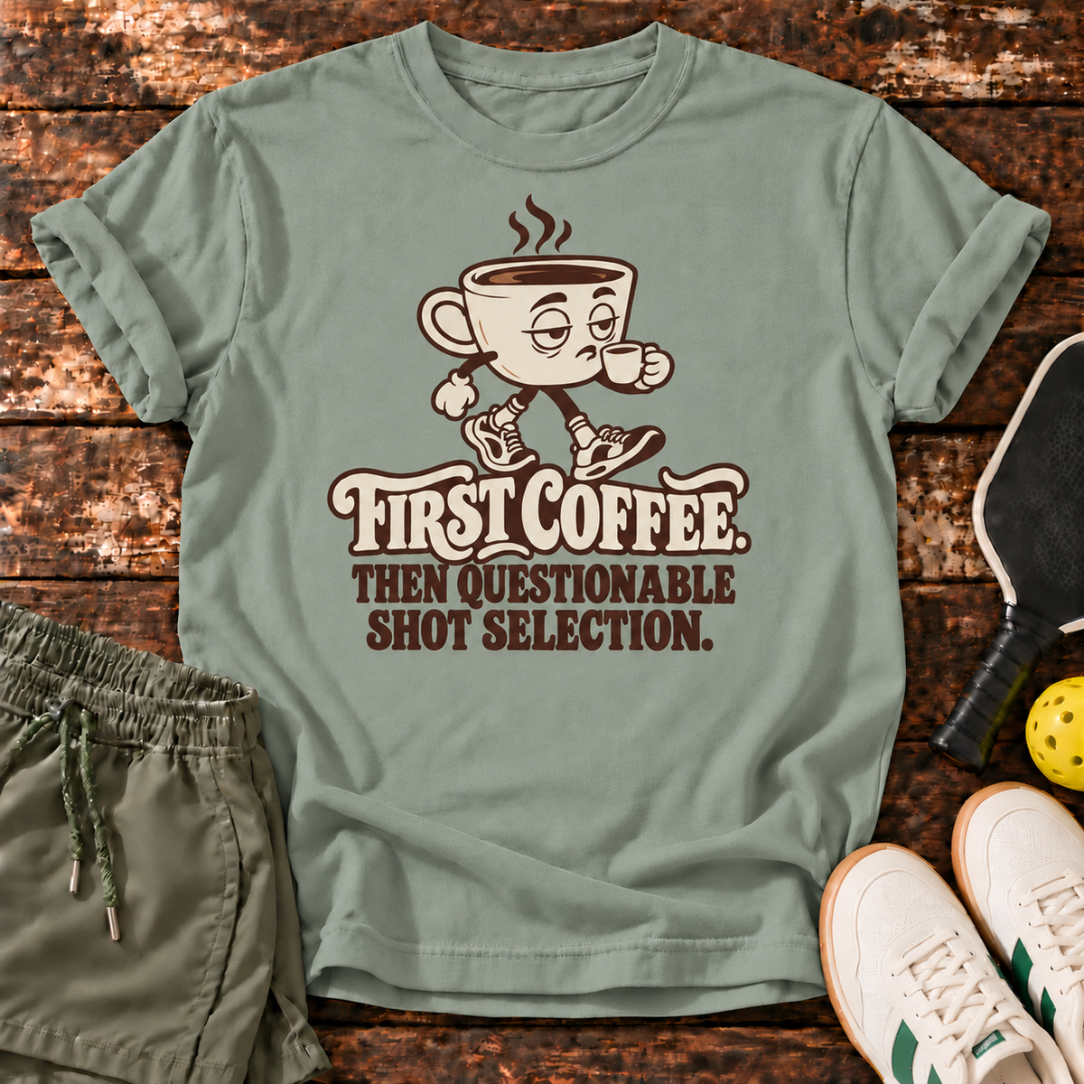 Coffee First T-Shirt — Sage — wood mockup