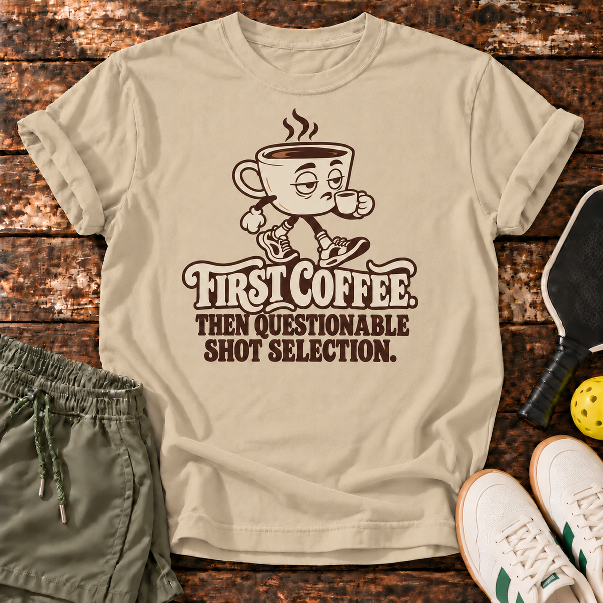 Coffee First T-Shirt — Sand — wood mockup