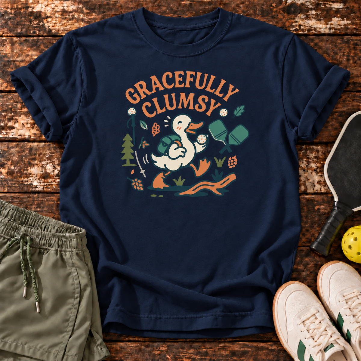 Gracefully Clumsy T-Shirt — Navy — Dink Society master mockup