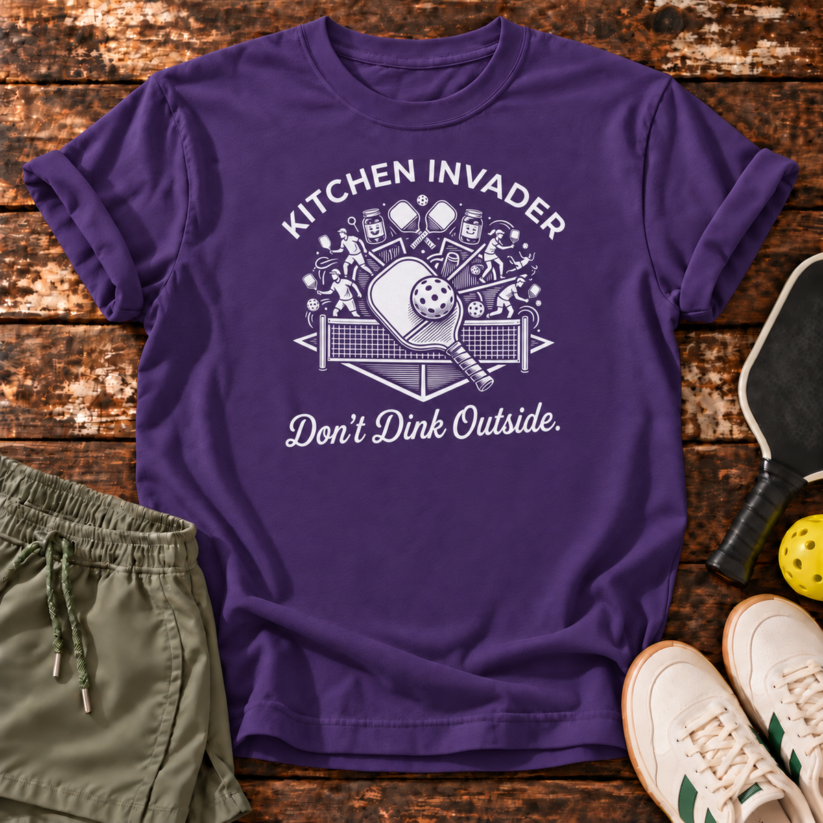Kitchen Invader T-Shirt — Purple — wooden flatlay