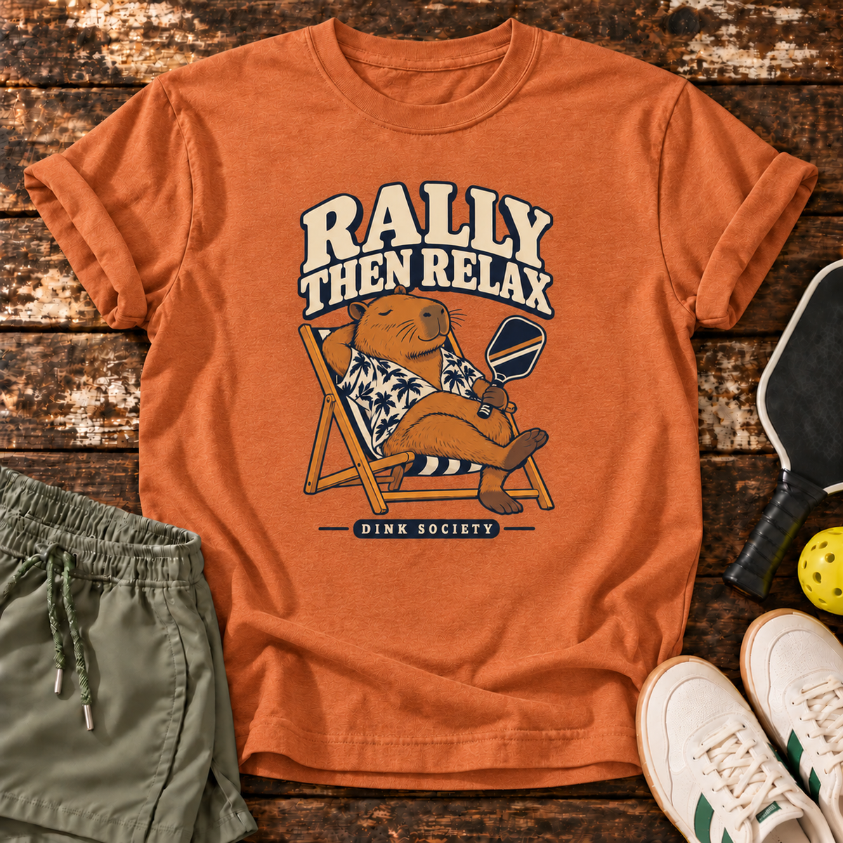 Rally Then Relax T-Shirt — Heather Orange — wooden flatlay